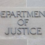 DOJ Inspector General Report Reveals Breach of Protocols by Officials in Election-Related Leaks Department of Justice sign on building wall.