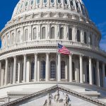 Machete Arrest at Capitol Security Checkpoint Ahead of Trump Meeting and Jimmy Carter Tribute U.S. Capitol dome with American flag flying.