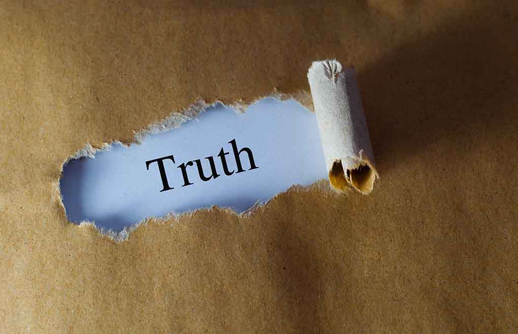 384729706 featured image Ripped paper reveals word truth underneath brown surface