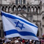 Israeli flag at a crowded outdoor event