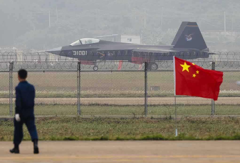 231381238 featured image Jet with 31001 marking behind barbed wire fence