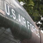 Global Tensions SPIKE—U.S. Bases on High Alert U.S. Air Force plane with trees in background.