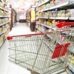 Ultra-Processed Foods: A Silent Health MENACE? Empty shopping cart in grocery store aisle