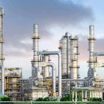 Desperate Measures: Wallkill’s $7.9M Infrastructure Play Industrial plant with metal towers and pipes