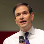 Rubio SECURES Mexico Deal – Groundbreaking Joint Agreement Man in white shirt speaking into a microphone.