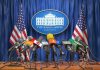 Press Secretary STUMBLES – Who Is She Protecting? Multiple microphones at White House press briefing podium.