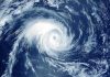 Caribbean on Edge—Storm’s Worst Days Ahead Satellite image of a swirling hurricane over ocean.