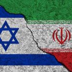 Children SLAUGHTERED — 46 Dead Overnight Israeli and Iranian flags divided by a cracked line.