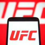 UFC Champ GUNNED DOWN – Horrific Shooting UFC logo on phone screen and background.