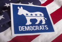 Senate SCANDAL – Candidates Bizarre Coverup EXPOSED! Democrats logo on American flag background