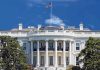 White House Bombshell: Congressman’s Intimidate Pics LEAKED! The White House with the American flag flying against a blue sky