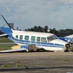 Plane STRIKES Woman — Disaster Landing! Damaged blue and white small airplane on an airport runway