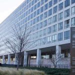 ALL FLIGHTS GROUNDED – Duffy Issues Warning! Orville Wright Federal Building with flags outside.