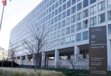 ALL FLIGHTS GROUNDED – Duffy Issues Warning! Orville Wright Federal Building with flags outside.