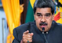 Venezuela MOBILIZES 200,000 Troops Against America Man speaking passionately and gesturing during a speech.