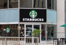 Starbucks storefront with glass doors and logo