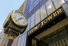 Clock in front of Trump Tower building entrance.