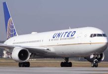 Bomb Scare Halts United Plane – Emergency Diversion United Airlines plane on the runway.