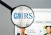 IRS Hammers GOP Senator – He OWES How Much? Magnifying glass over IRS website.