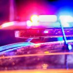 Illegal Alien Opens Fire – Cops Ambushed! Police car lights flashing at night.