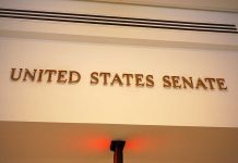 China SLAMS U.S Senator with $50B Lawsuit! Sign displaying United States Senate in a government building