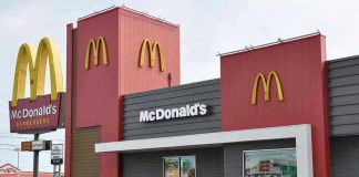 Airborne Car Smashes Into McDonald’s! McDonalds restaurant exterior with logo and drive-thru sign.