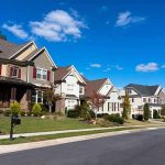 Fatal Domestic Dispute – 7 DEAD In Murder-Suicide! A row of modern suburban houses under a clear blue sky
