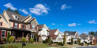 Fatal Domestic Dispute – 7 DEAD In Murder-Suicide! A row of modern suburban houses under a clear blue sky
