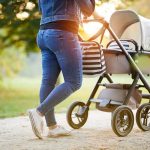 Homeless Psycho Launches Insane Stroller Attack! Person pushing a baby stroller on a park path