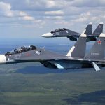F-16’s SCRAMBLED To Protect Trump Two fighter jets flying in formation over landscape