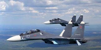 F-16’s SCRAMBLED To Protect Trump Two fighter jets flying in formation over landscape