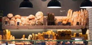 Bakery display with assorted breads and pastries