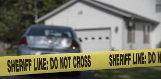 Illegal Alien GUNS DOWN Veteran On Front Porch Sheriff line tape blocking a suburban driveway