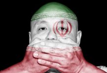 person with hands over mouth and Iran flag overlay