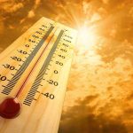 Hundreds HOSPITALIZED In Disaster Heatwave A thermometer displaying temperature against a sunset sky