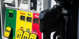 Trump Tells Americans To Deal With Gas High Prices Gas pump with diesel, regular, plus, and premium fuel options