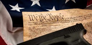 Judge ENDS 92-Year Gun Law – Trump APPROVES Handgun on U.S. Constitution with American flag backdrop