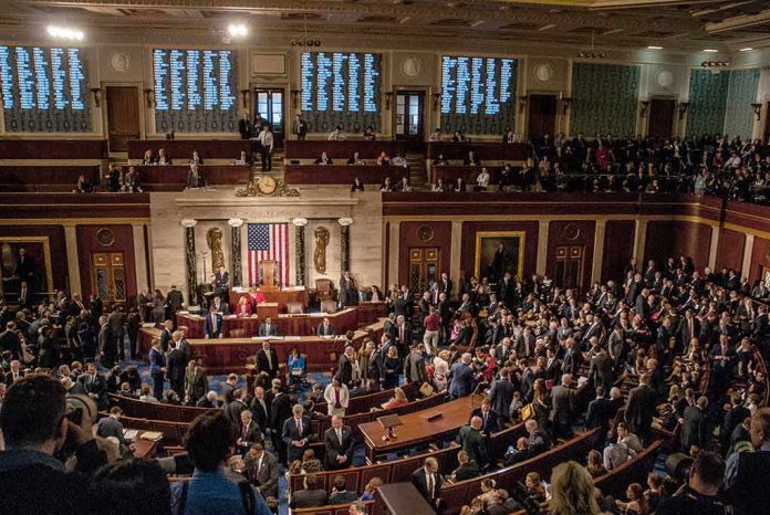House chamber filled with lawmakers and staff