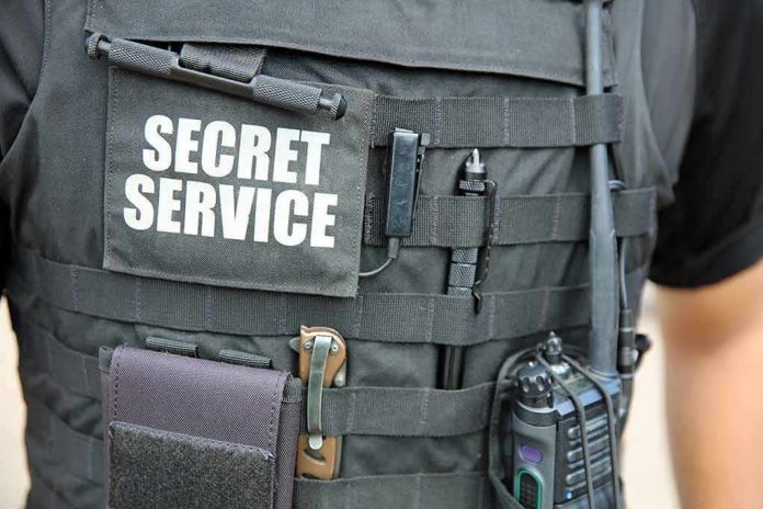 shutterstock_1520321309 Tactical vest with Secret Service patch and gear