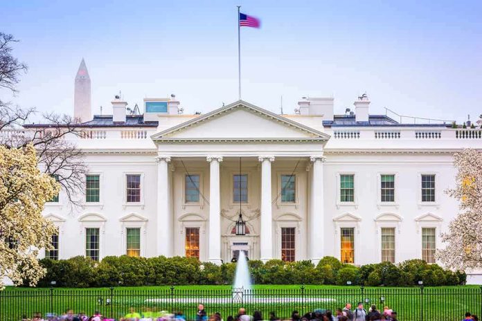 The White House facade with fountain and flag