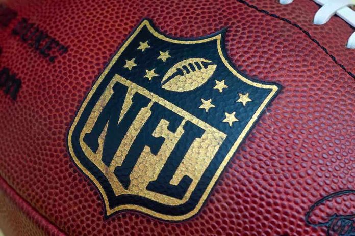 shutterstock_212182807 Close-up of an NFL football with the logo prominently displayed