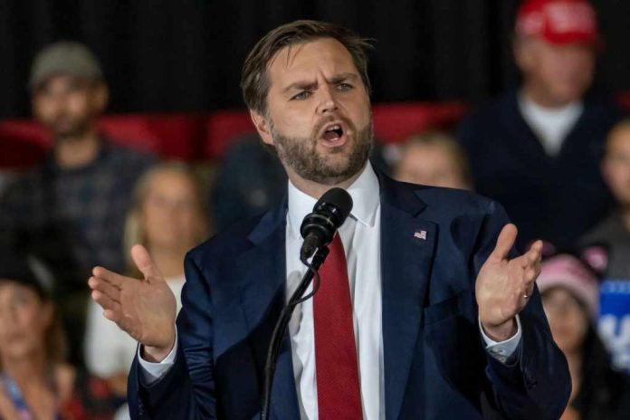 54801cb8-0515-4c34-a2d8-f79705e6683e_shutterstock2542628059jpg Man in suit speaking at a podium