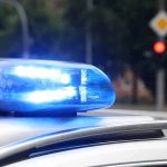 Dem Candidate ARRESTED – Cuffed In Patrol Car Police car blue siren light flashing