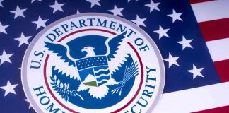Masked ICE Agents Pepper-Spray, Punch Students Entering School U.S. Department of Homeland Security emblem on American flag