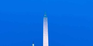 Washington Monument with Lincoln Memorial and Capitol at dusk