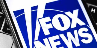 Fox News Host Destroys Muslim Candidate Over Breast Cancer Debate Fox News logo displayed on a smartphone screen
