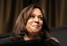 woman speaking at a podium