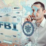 Man on phone behind digital interface with FBI and cybersecurity graphics