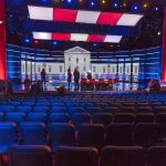 Trump Targets ABC, NBC After THIS Happened! Debate stage with red and blue lighting and empty audience seats