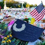 Ground Zero Families Issue Mamdani Stark Ultimatum Memorial site with flowers and a U.S. flag